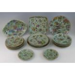 A collection of Chinese Canton famille rose plates and dishes, 19th century, each enamel decorated