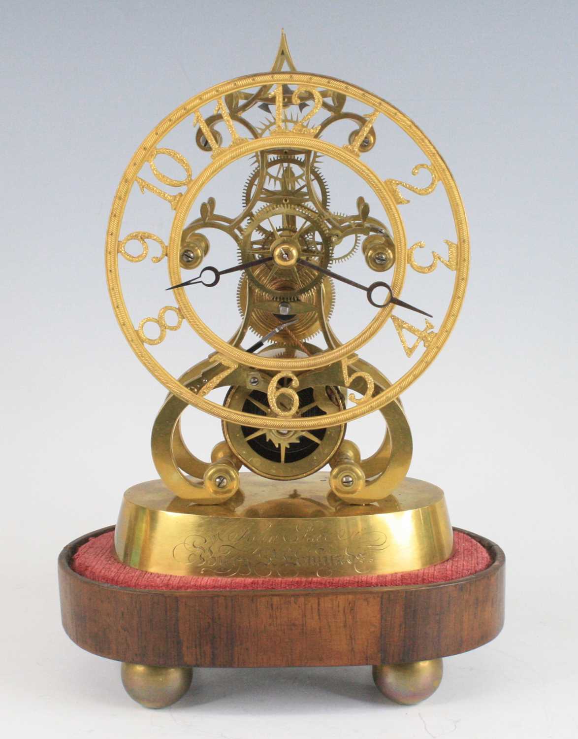 John Pace of Bury St Edmunds - a brass skeleton clock, having a textured Arabic dial, pierced blue