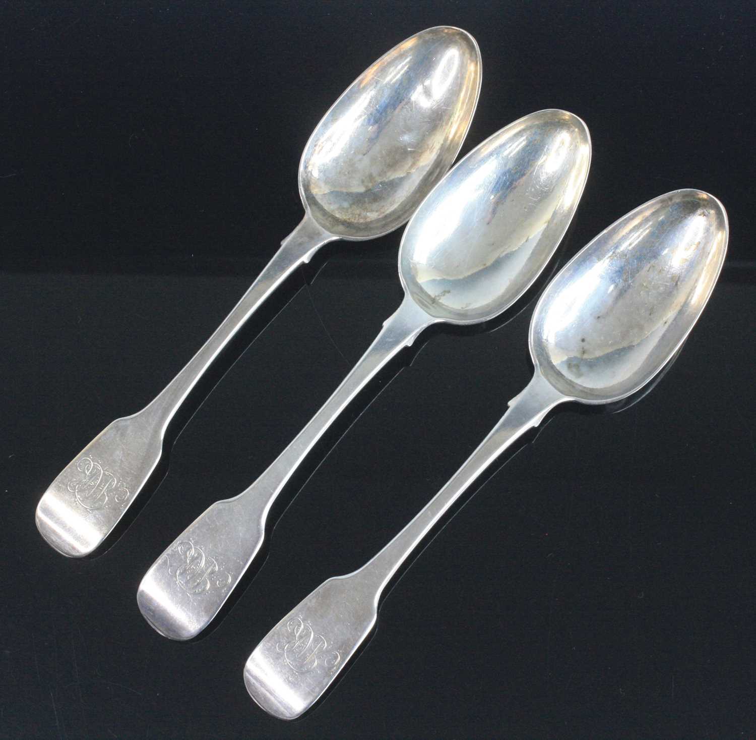 A set of three George IV York silver tablespoons, in the Fiddle pattern with monogrammed