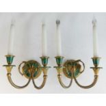 A pair of French gilt bronze and malachite twin branch wall lights, the circular backplates with