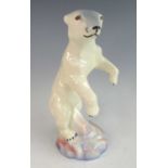 A Czechoslovakian Art Deco glazed ceramic figure of a polar bear, modelled standing on its hind