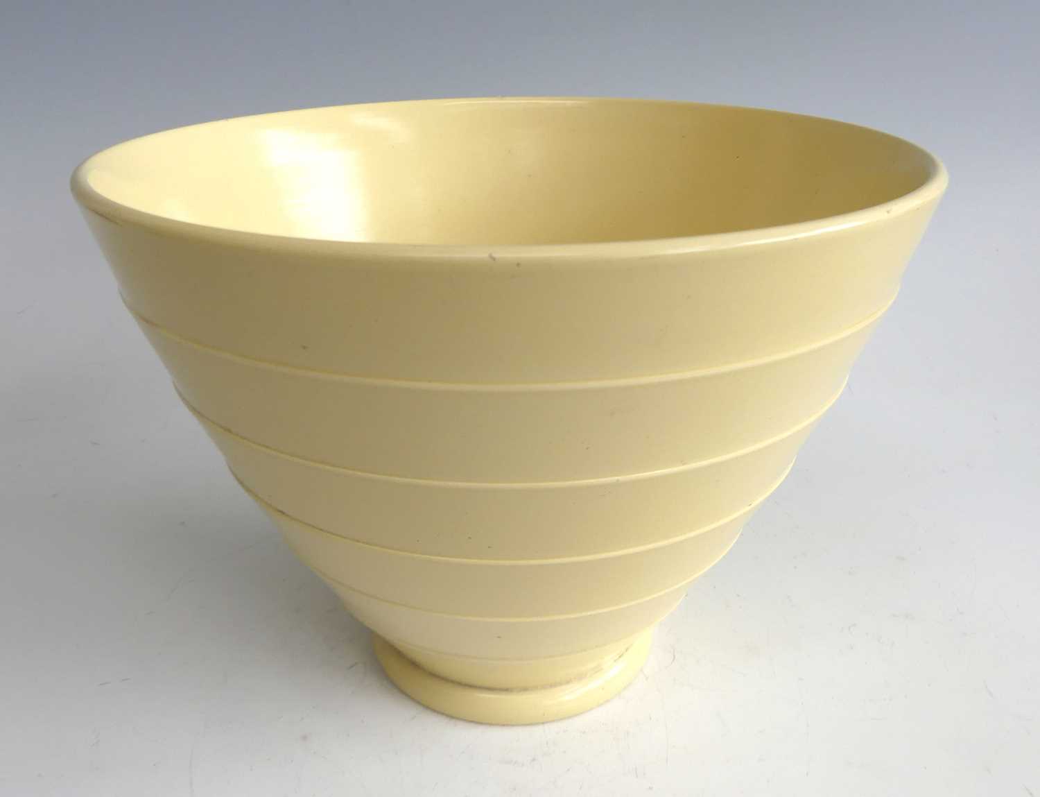 Keith Murray (1892-1981) for Wedgwood - a large matt straw glaze pottery table bowl, with six