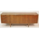 A 1960s teak long sideboard by A.H. McIntosh Ltd, having twin central cupboard doors, single fall-