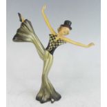 A 1930s Wade Pottery cellulose figure group titled Ginger 17, modelled as a female dancer, her
