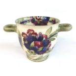 An early 20th century Moorcroft Persian pattern pottery twin handled Cachepot, of very slightly