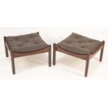 A pair of 1960s Danish hardwood square footstools, each with buttoned leather removable cushions,