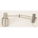 A 1970s Danish brushed aluminium and coated steel branch wall light, with hinged action, the shade