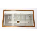 A large early 20th century Hovis advertising mirror, housed in a plain walnut frame, with applied