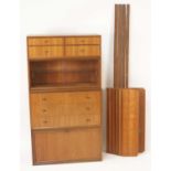 A 1960s Danish Royal System teak modular wall unit, comprising; compartment of three long drawers,