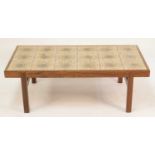 A 1960s Danish rosewood and tile top inset rectangular coffee table by Oxart for Trioh, the stylised