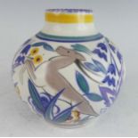 A 1930s Poole pottery bulbous vase, decorated with stylised leaping antelope within foliage,
