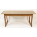 A Heal's oak 'Letchworth' dining table, circa 1905, designed by Ambrose Heal, of plain rectangular