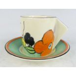 A 1930s Clarice Cliff Poplar pattern pottery coffee can and saucer, with angular block handle,