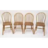 A pair of 1960s Ercol blond elm stickback kitchen chairs, w.40cm; together with a pair of 1960s