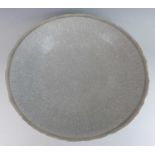 In the style of Lucie Rie - a large crackle glazed studio pottery table bowl, of circular wok
