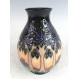A contemporary Moorcroft Cluny pattern pottery vase, of lower baluster form, underglaze painted