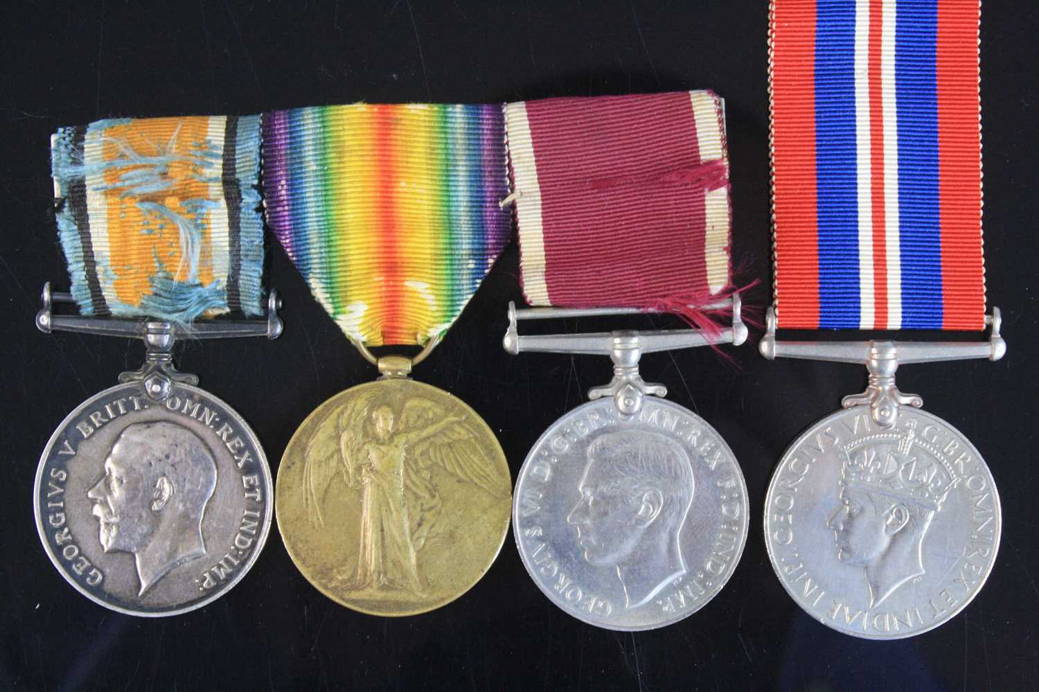 A WW I British War and Victory pair, naming 106869 PTE. S.P. POULTER. NOTTS. & DERBY. R. together