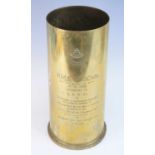A large brass shell case with applied Royal Australian Artiullery badge, inscribed "R.M.S. Orsova (