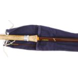 A Hardy The Swing-Tip, 9' 6" two piece fibalite rod, in blue canvas bag.