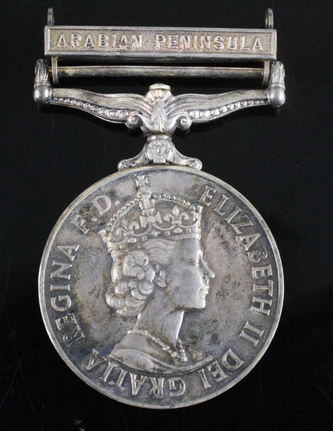 An E.R. II. General Service medal (1918-62) with Arabian Peninsula clasp, naming 23612084 PTE. M.