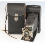 A Kodak 3A Autographic Film Camera No. A-122, circa 1914, in original black leather case with hand