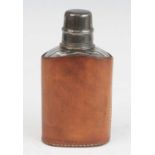 A George V pocket hip flask, having a glass body with removeable silver cap and plated inner screw