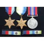 A group of three WW II medals, to include 1939-1945 Star, Atlantic Star and War, together with an