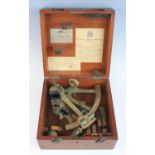 A George V. E.R. Watts & Son marine sextant having an 8 inch radius, the brass vernier scale