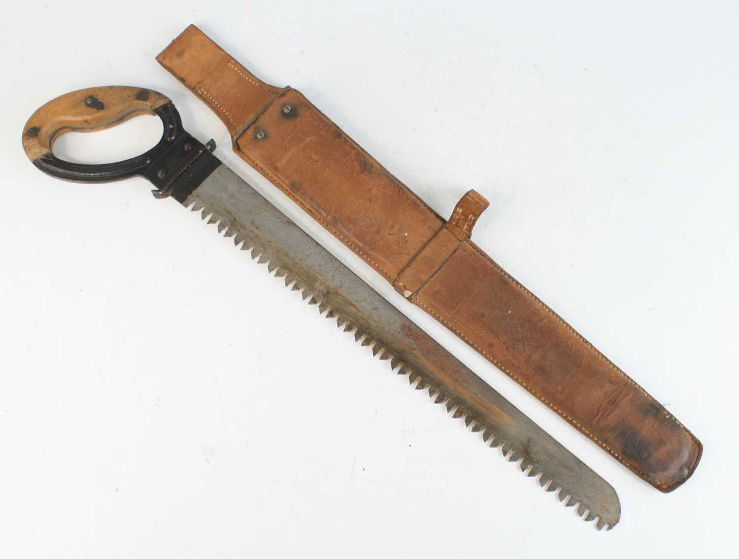 A German Third Reich Pioneer saw (Stichsage), the 40.5cm steel blade dated 1939, housed in the