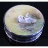 An early 20th century silver patch/pill box, the circular hinged lid inset with a Royal Worcester