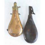 A 19th century copper powder flask, of typical pear shape, the brass nozzle measuring 2 1/4 - 3