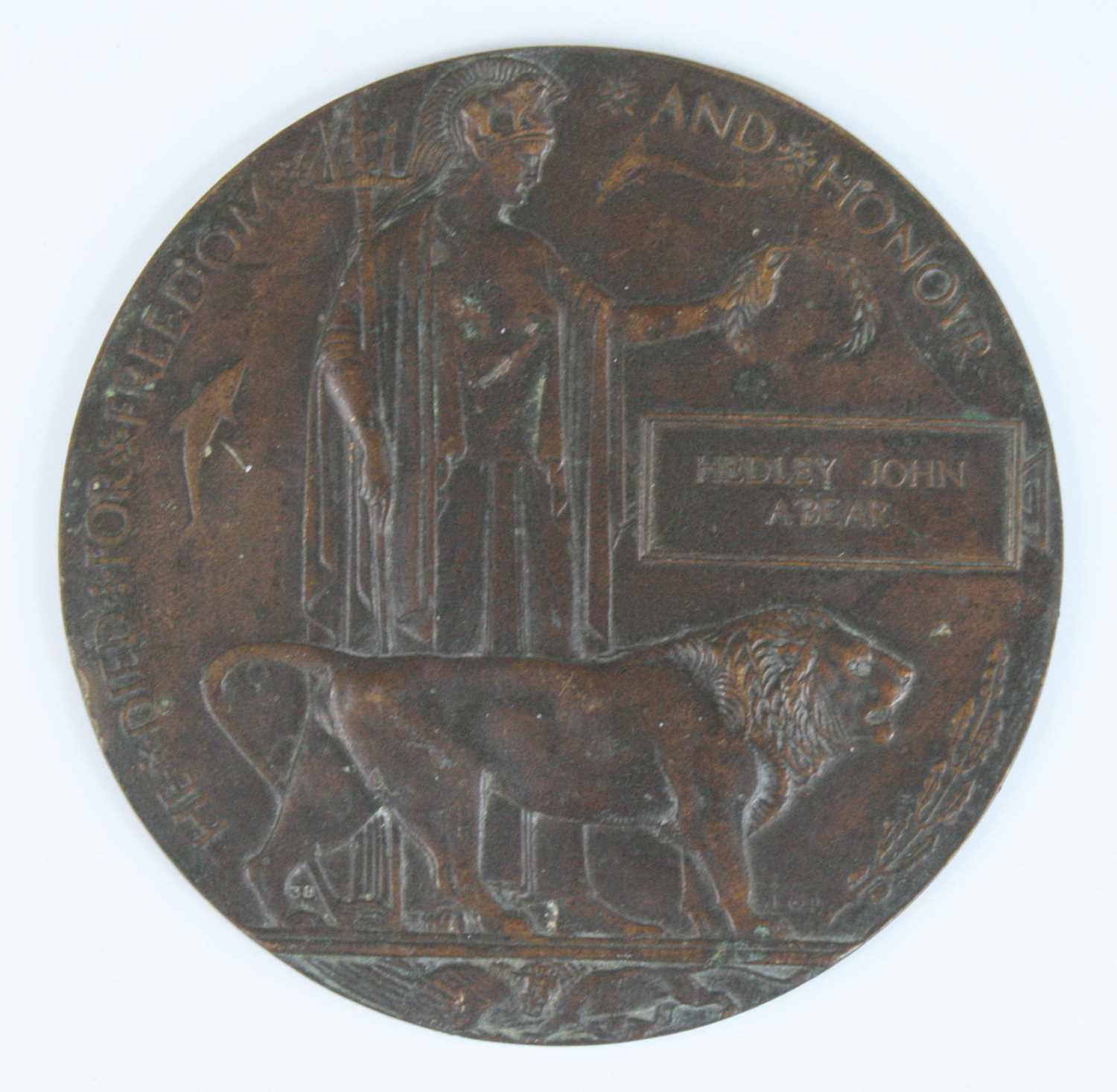 A WW I bronze memorial plaque, naming Hedley John A'Bear. Captain A'Bear Queen's (Royal West
