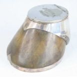 A George V horse hoof inkwell, having a silver plated horse shoe mount and hinged lid with