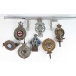 A collection of six various RAC cast metal car badges, some with enamel detail; together with a