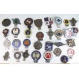 A large collection of vintage principally chromed metal car badges, some enamel decorated, to