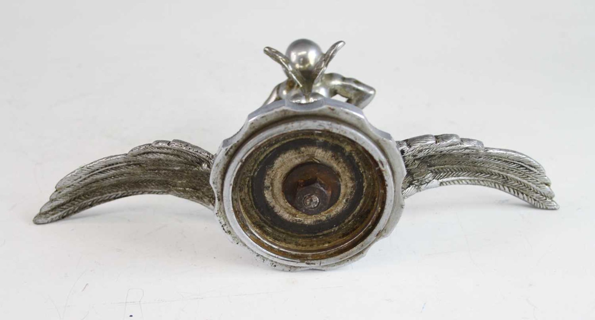 A vintage cast chromed metal car mascot of Dinky Doo, raised on winged and notched circular base, - Image 4 of 4