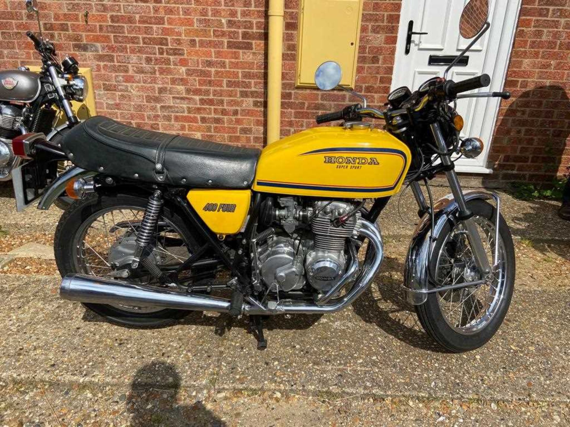 A 1977 Honda 400 Four Supersport 408cc motorbike Registration No. XJX 543R Chassis No. - Image 3 of 10