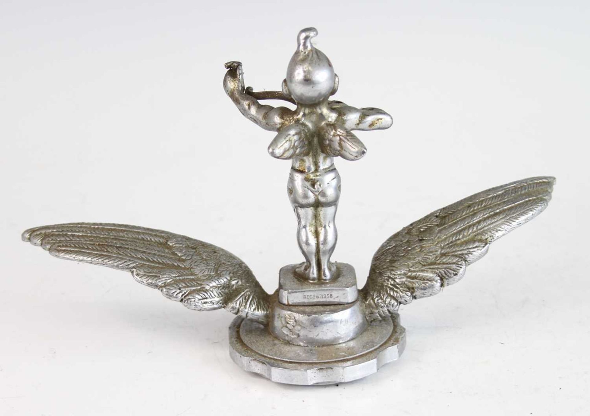 A vintage cast chromed metal car mascot of Dinky Doo, raised on winged and notched circular base, - Image 3 of 4