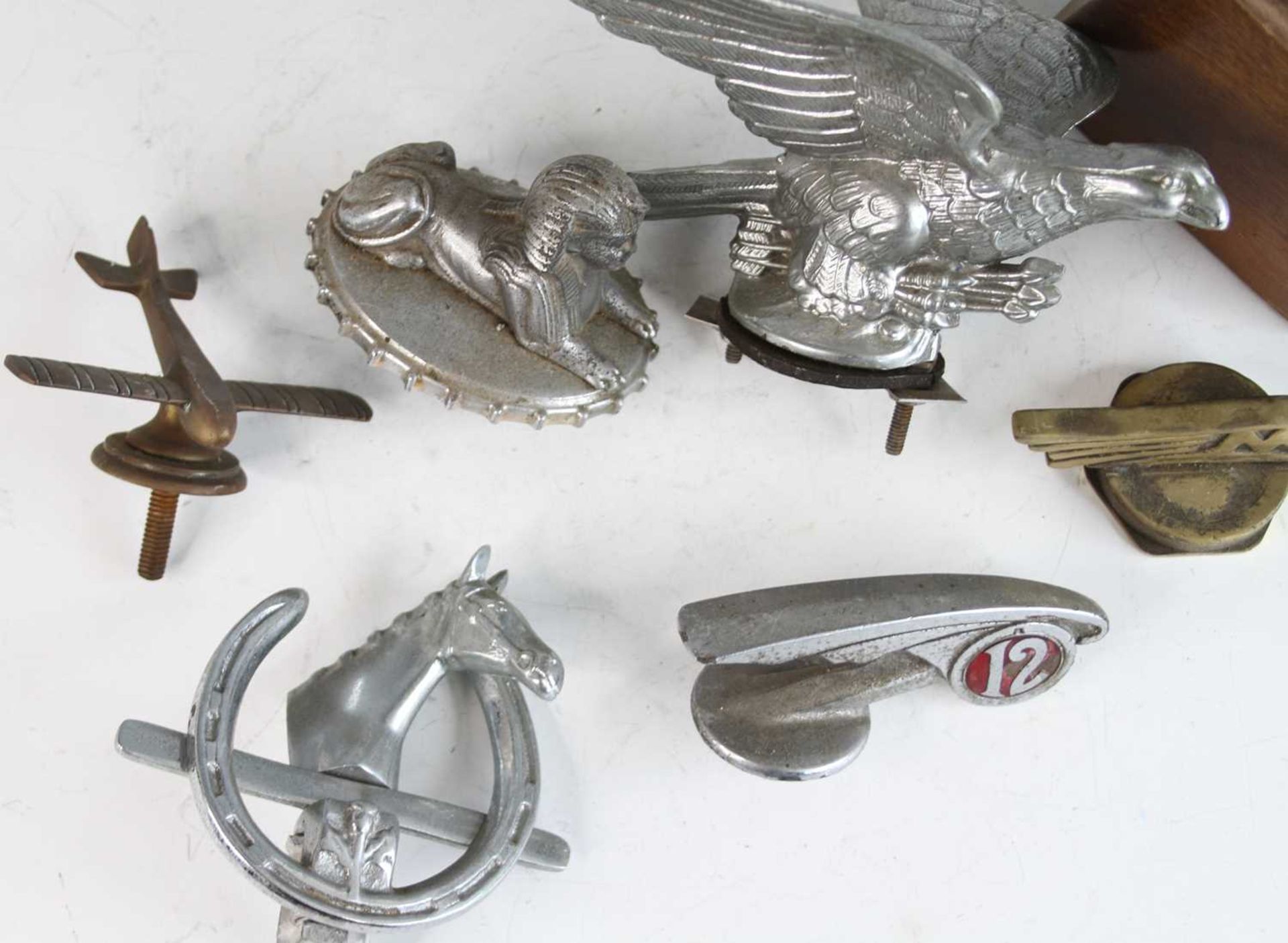 A collection of eight various vintage chromed metal and brass car mascots, to include a stylised - Image 2 of 3