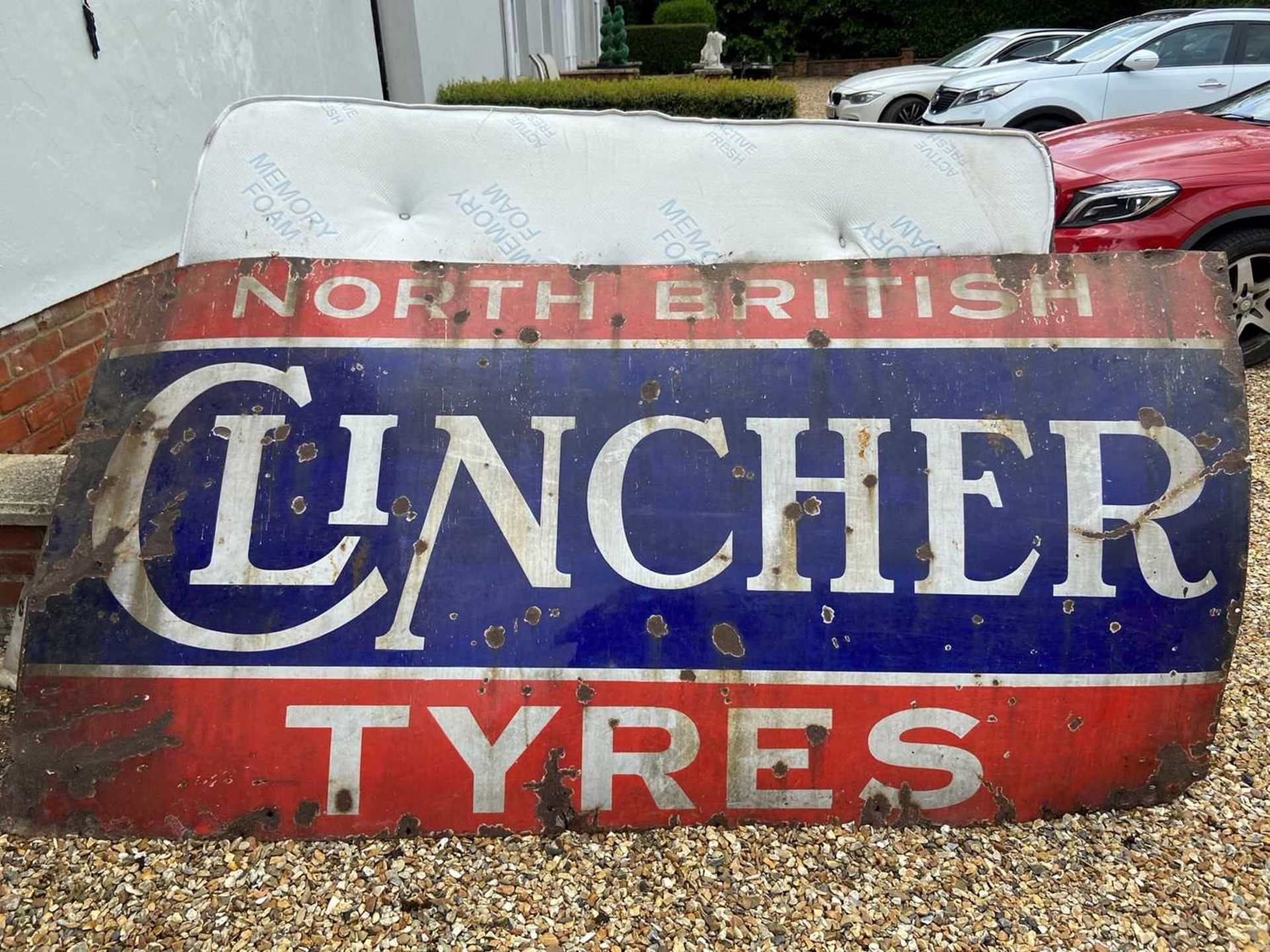 A North British Clincher Tyres enamel advertising sign, 121 x 244cm