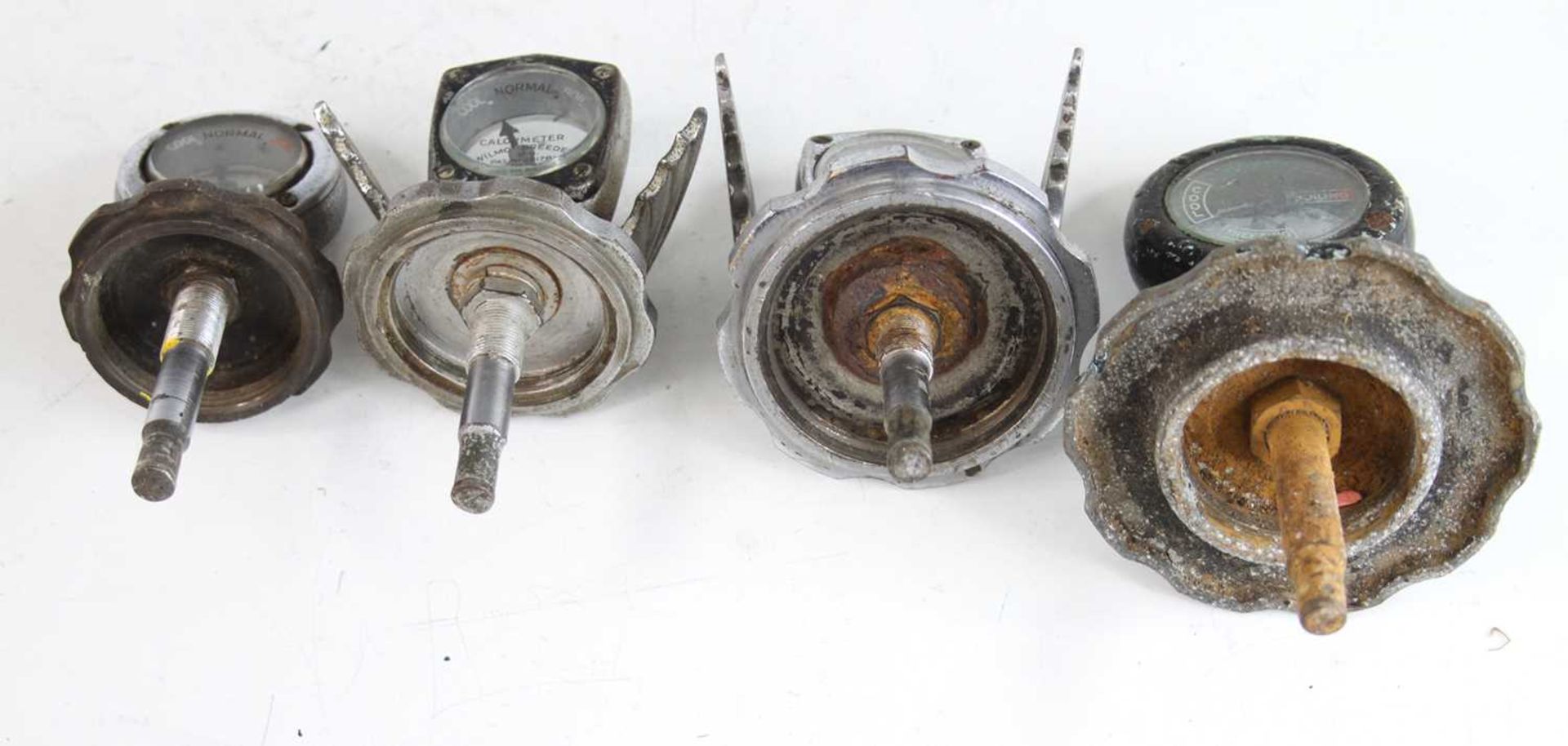 A collection of four various vintage radiator calormeters, two being chromed metal with stylised - Image 2 of 2