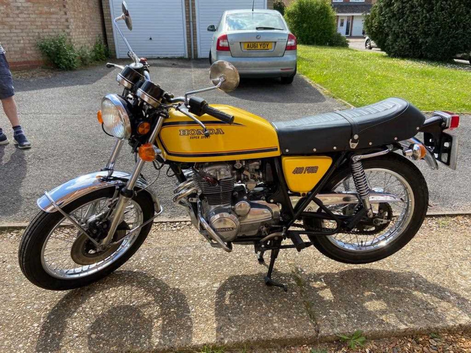 A 1977 Honda 400 Four Supersport 408cc motorbike Registration No. XJX 543R Chassis No.