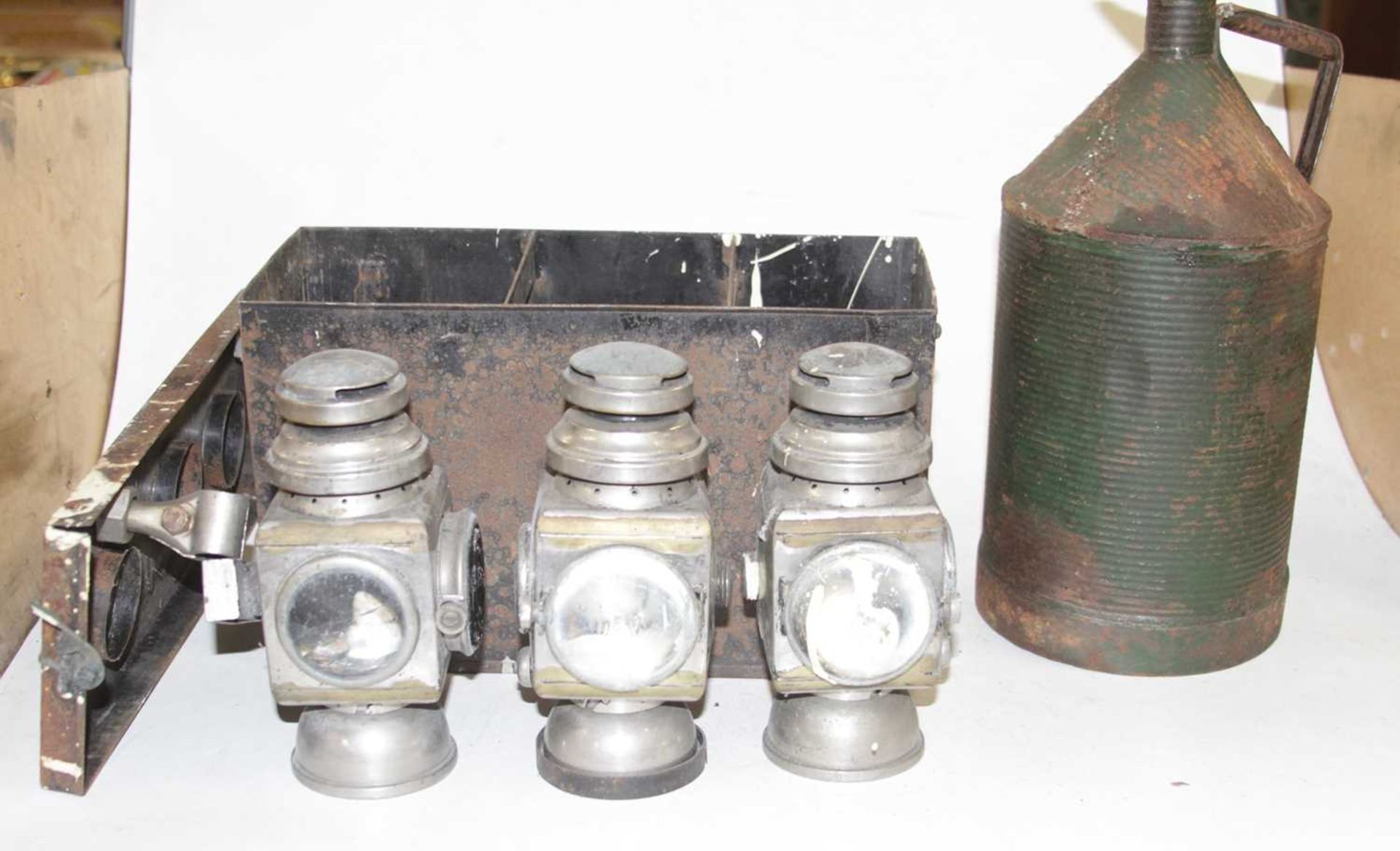 A cased set of three lamps, sundry oil cans, a Churchill vintage motorcycle fuel tank, unopened - Image 3 of 3