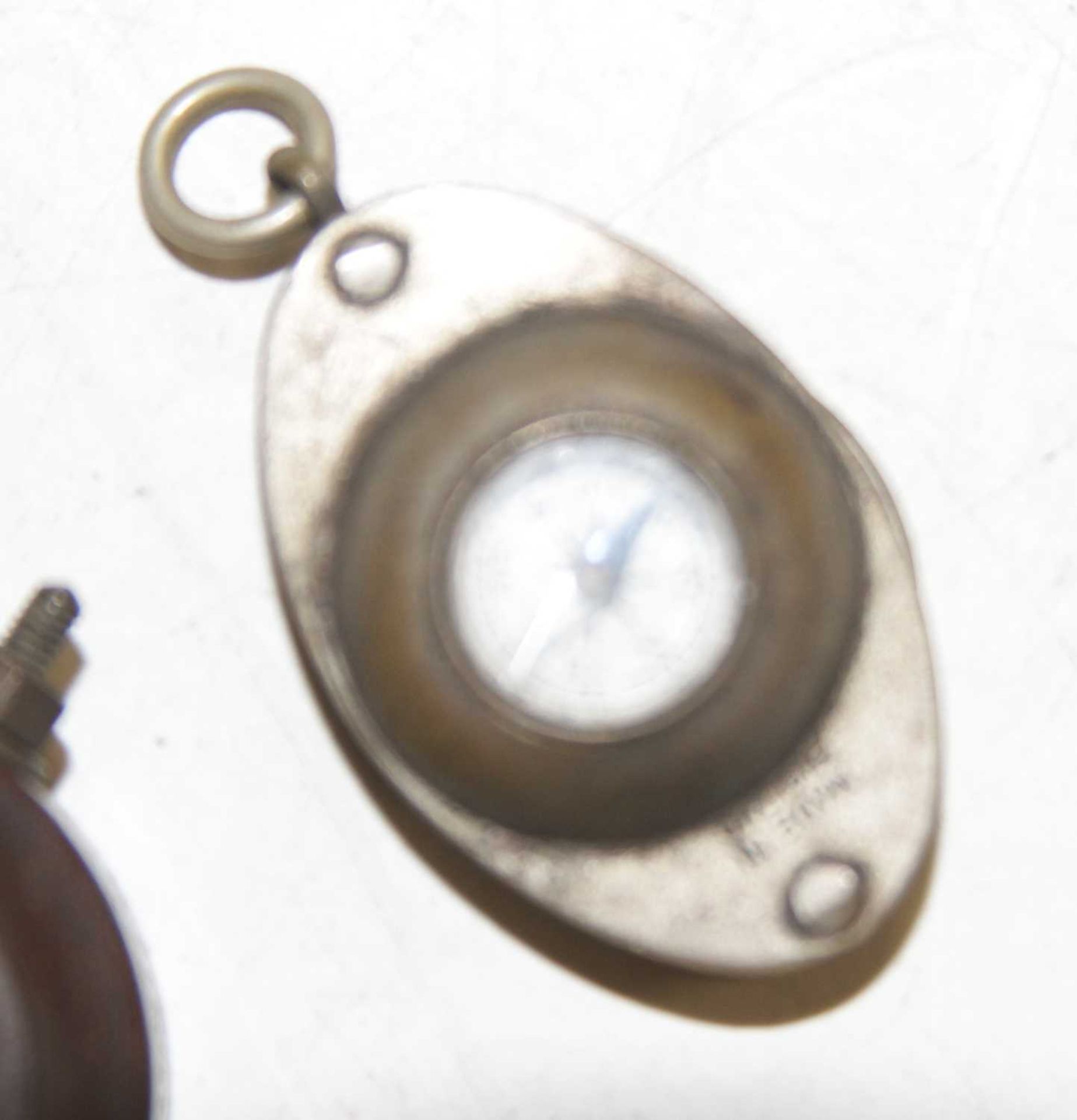 A miniature pocket compass, with inset loup, together with a miniature dashboard(?) compass (2) - Image 3 of 4