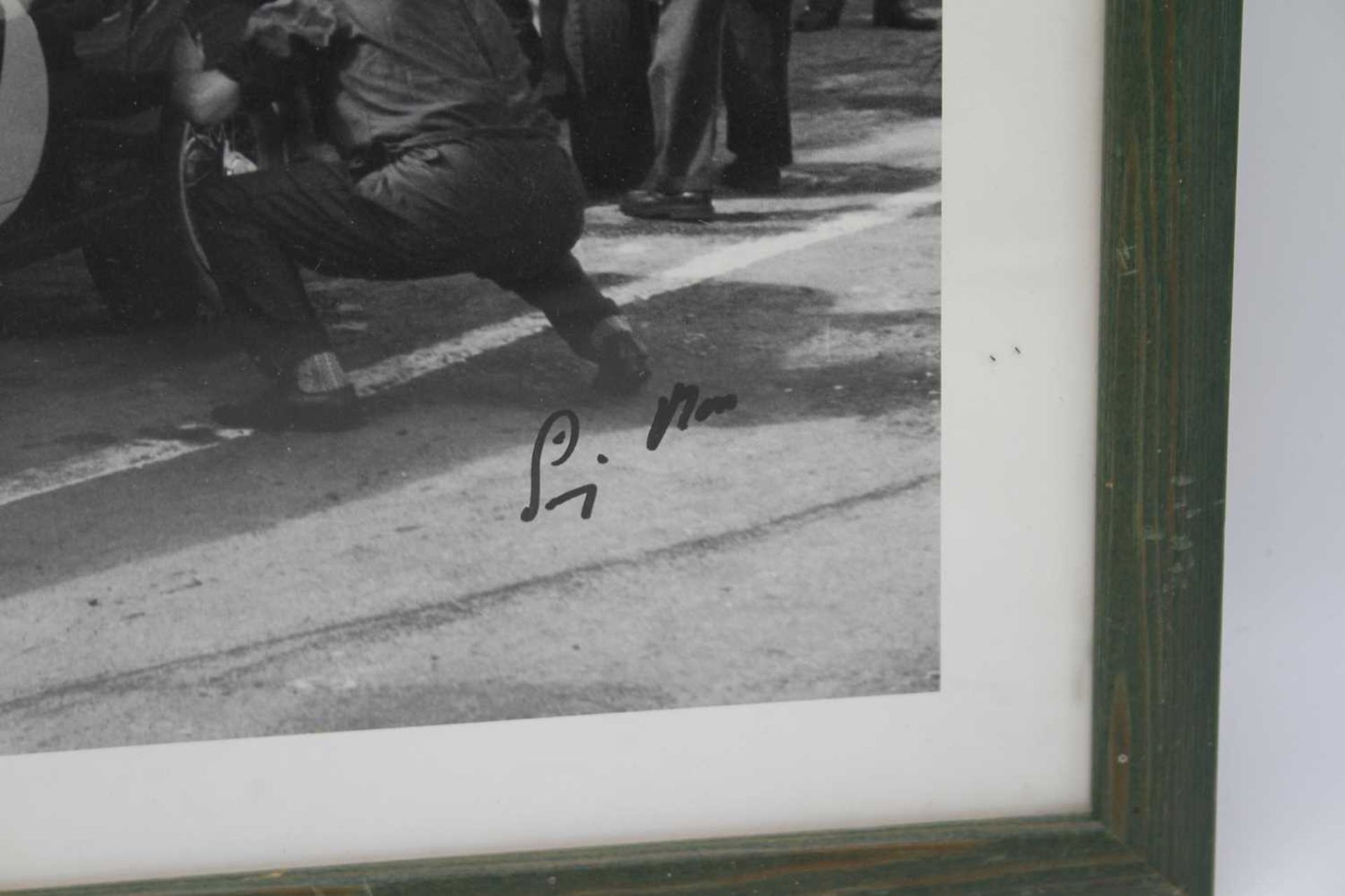 A signed photographic print of Stirling Moss in 1961 beside his SWB Ferrari 250GT, signed by Moss - Image 3 of 3