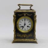 A 19th century French mantel clock, the enamel dial showing Roman numerals, the 8-day movement