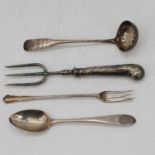 A George III Irish silver bright cut tablespoon, together with a silver ladle and silver pickle