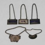 A set of three Elizabeth II silver and blue enamelled decanter labels, Birmingham 1952 , maker