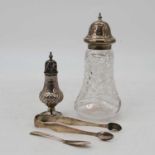 A pair of George III silver sugar nips, London 1805, together with a Victorian silver pepper of