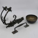 A Rococo style metal twin branch wall sconce, height 45cm, together with a hammer beaten metal bowl,